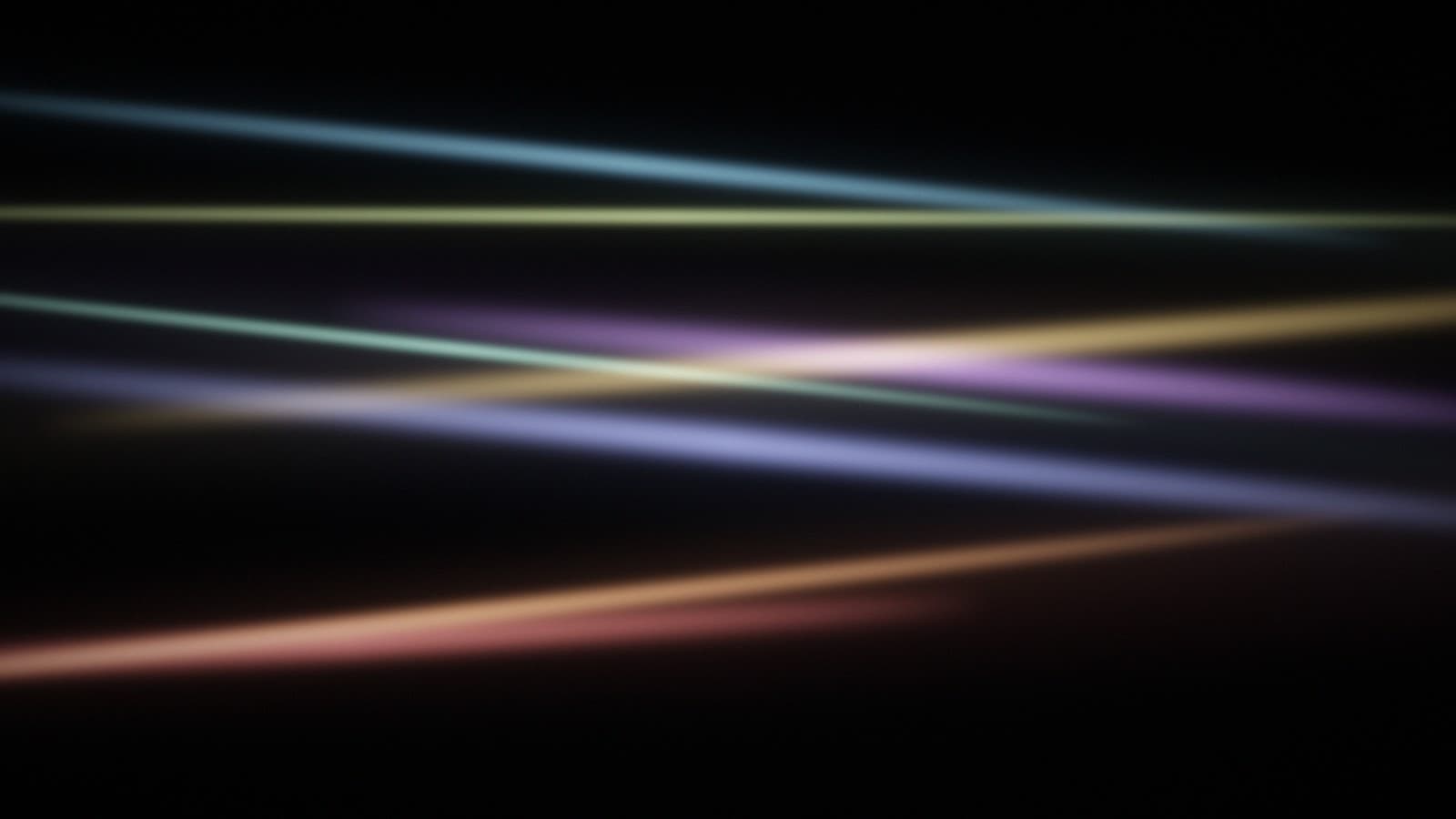 Long planes of light stacked in depth, receding toward a dark horizon.