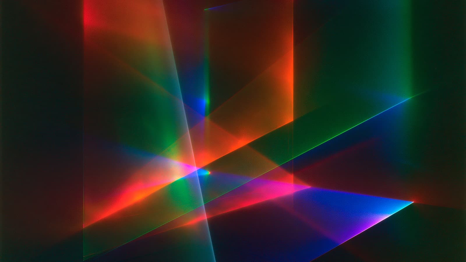Intersecting planes of coloured light standing like a lit grid in the dark.