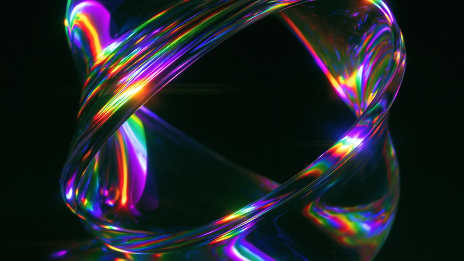 A closed loop of glass refracting a spectrum back into itself.